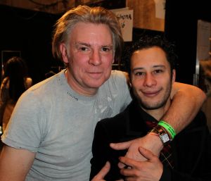 30-01-2012 SHOWBIZZ; ERNY VAN REIJMERSDAL TOONDE ZIJN NIEUWE COLLECTIE OP AMSTERDAM FASHIONWEEK. Het bloed kruipt waar het niet kan gaan, zegt Erny na zijn schitterende modeshow op de A.F.W. Bij het zien van het eerste gedeelte van de show weet en voel je al de vakmanschap van Erny. Prachtige stoffen en opmerkelijk veel vossen bont, gecombineerd met prachtige stoere laarzen en ruig leer. Iedereen ging op de banken staan en Erny en zijn partner genoten van het minutenlang applause.
foto: Albert den Iseger.