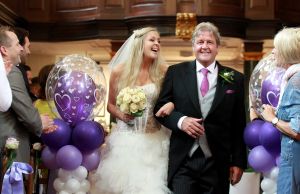 09-07-2014 SHOWBIZZ; CORRY KONINGS HUILT VAN GELUK BIJ BRUILOFT VAN DOCHTER SHARONA. Corry huilde in het Waalse kerkje dikke tranen om het geluk van haar dochter Sharona. Haar beide ex mannen  Cor de Vries en Ton Snoeren waren ook aanwezig op de bruiloft. Als gasten traden op Frans Bauer en Roy Donders.
foto: Albert den Iseger