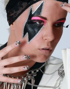 14-06-2013 ONDERWIJS: HAARLEMSE AKADEMIE IN BAN VAN LADY GAGA. Het was weer erg druk, kleurig en vooral veel make up. De VISAGIE examen opdracht was dit jaar Lady GaGa. De leerlingen hadden erg hun best gedaan om hun modellen op te maken en te kleden als lady GaGa. Na een lange dag bleek dat alle leerlingen waren geslaagd met mooie cijfers. De Haarlemse Akademie is wederom een van Nederlands beste opleidings instituten gebleken. 
foto: Albert den Iseger