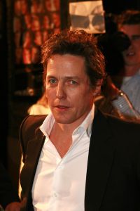 23-02-2007 SHOWBIZZ; BOEIENDE PREMIERE VAN MUSIC EN LYRICS IN AMSTERDAM. Hugh Grant zal zijn premiere in Amsterdam niet gauw vergeten, hij werd namelijk nog voor de rode loper in de boeien geslagen door Cielke Syben.De politiie moest er aan te pas komen met een betonschaar om hem van het staal te bevrijden. 
Cielke werd gearresteerd en de film was er niet minder om.
foto: Albert den Iseger.