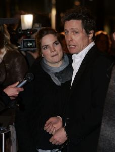 23-02-2007 SHOWBIZZ; BOEIENDE PREMIERE VAN MUSIC EN LYRICS IN AMSTERDAM. Hugh Grant zal zijn premiere in Amsterdam niet gauw vergeten, hij werd namelijk nog voor de rode loper in de boeien geslagen door Cielke Syben.De politiie moest er aan te pas komen met een betonschaar om hem van het staal te bevrijden. 
Cielke werd gearresteerd en de film was er niet minder om.
foto: Albert den Iseger.