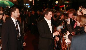 23-02-2007 SHOWBIZZ; BOEIENDE PREMIERE VAN MUSIC EN LYRICS IN AMSTERDAM. Hugh Grant zal zijn premiere in Amsterdam niet gauw vergeten, hij werd namelijk nog voor de rode loper in de boeien geslagen door Cielke Syben.De politiie moest er aan te pas komen met een betonschaar om hem van het staal te bevrijden. 
Cielke werd gearresteerd en de film was er niet minder om.
foto: Albert den Iseger.