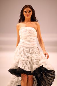 31-03-2008 SHOWBIZZ; MONIQUE COLLIGNON PRESENTEERDE WAANZINNIGE COUTURE COLLECTIE VOORJAAR 2008. In het decor van staal en de sfeer van een oude fabriek presenteerde MC. een waanzinnige zomercollectie voor de meer dan 500 aanwezige. Heup wiegend flaneerden 19 modellen over de witte catwalk met felgekleurde creaties en prachtige hoeden. De kleuren  Zwart wit bepaalden ook een groot blok van de bijzondere voorjaarscollectie. Het trouwe MC publiek was laaiend enthousiast,  en terecht want een dergelijk show komt niet dagelijks voor in Amsterdam. Vele bekenden waren weer aanwezig oa. Annemarie van Gaal, Jasmine Sendar in een prachtige creatie van Addy van de Krommenacker -zij durft wel- Micky Hoogendijk met Hummer, Daphne Dekkers, Stella Gomans, Jan en Monique des Bouvrie en natuurlijk onze mode verslaggever en deskundige Maik de Boer.
foto: Albert den Iseger.
