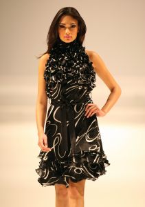 31-03-2008 SHOWBIZZ; MONIQUE COLLIGNON PRESENTEERDE WAANZINNIGE COUTURE COLLECTIE VOORJAAR 2008. In het decor van staal en de sfeer van een oude fabriek presenteerde MC. een waanzinnige zomercollectie voor de meer dan 500 aanwezige. Heup wiegend flaneerden 19 modellen over de witte catwalk met felgekleurde creaties en prachtige hoeden. De kleuren  Zwart wit bepaalden ook een groot blok van de bijzondere voorjaarscollectie. Het trouwe MC publiek was laaiend enthousiast,  en terecht want een dergelijk show komt niet dagelijks voor in Amsterdam. Vele bekenden waren weer aanwezig oa. Annemarie van Gaal, Jasmine Sendar in een prachtige creatie van Addy van de Krommenacker -zij durft wel- Micky Hoogendijk met Hummer, Daphne Dekkers, Stella Gomans, Jan en Monique des Bouvrie en natuurlijk onze mode verslaggever en deskundige Maik de Boer.
foto: Albert den Iseger.