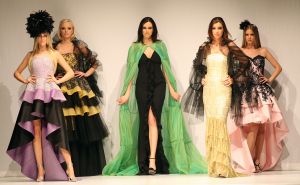31-03-2008 SHOWBIZZ; MONIQUE COLLIGNON PRESENTEERDE WAANZINNIGE COUTURE COLLECTIE VOORJAAR 2008. In het decor van staal en de sfeer van een oude fabriek presenteerde MC. een waanzinnige zomercollectie voor de meer dan 500 aanwezige. Heup wiegend flaneerden 19 modellen over de witte catwalk met felgekleurde creaties en prachtige hoeden. De kleuren  Zwart wit bepaalden ook een groot blok van de bijzondere voorjaarscollectie. Het trouwe MC publiek was laaiend enthousiast,  en terecht want een dergelijk show komt niet dagelijks voor in Amsterdam. Vele bekenden waren weer aanwezig oa. Annemarie van Gaal, Jasmine Sendar in een prachtige creatie van Addy van de Krommenacker -zij durft wel- Micky Hoogendijk met Hummer, Daphne Dekkers, Stella Gomans, Jan en Monique des Bouvrie en natuurlijk onze mode verslaggever en deskundige Maik de Boer.
foto: Albert den Iseger.
