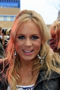 26-10-2006 SHOWBIZZ; PREMIERE VAN THEATERTOUR KUS JE VRIENDEN. Na vandaag zijn  Meike -  Fleur- Anouk en Monique te bewonderen in verschillende theaters door het hele land met hun KUS je vriendentour. Het niuwe album van KUS ligt in de winkel en het is onder tussen al beloond met een Gouden Award. Vele BNers waren komen opdraven met hun kinderen in het Fortis Circustheater te Scheveningen.
Foto: Albert den Iseger. 